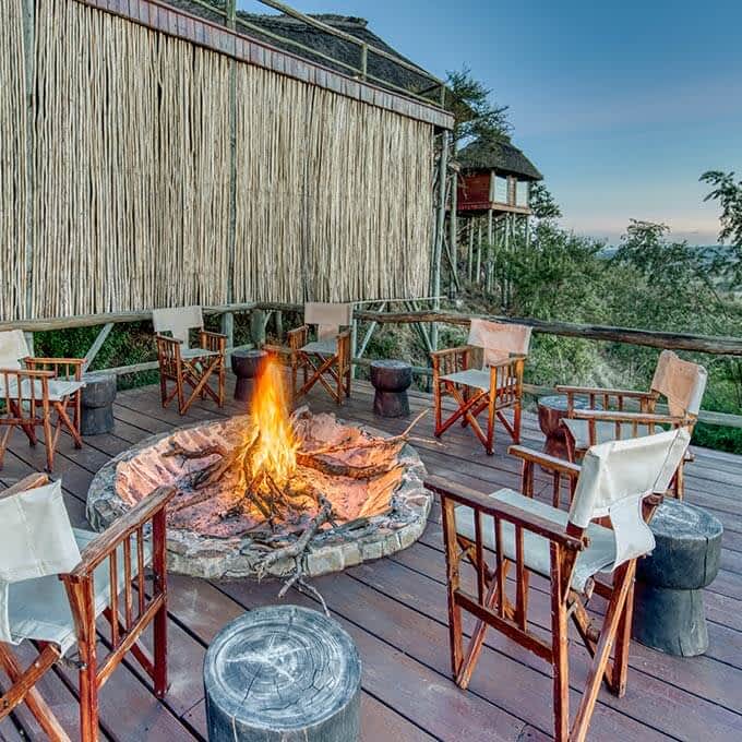 Share your Serengeti safari stories at Mbali Mbali Soroi Serengeti Lodge around a camp fire