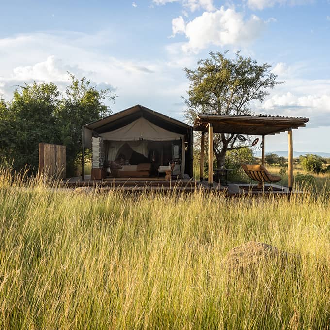 Singita Mara River Tented Camp offers you an exclusive safari experience in the Serengeti in Tanzania