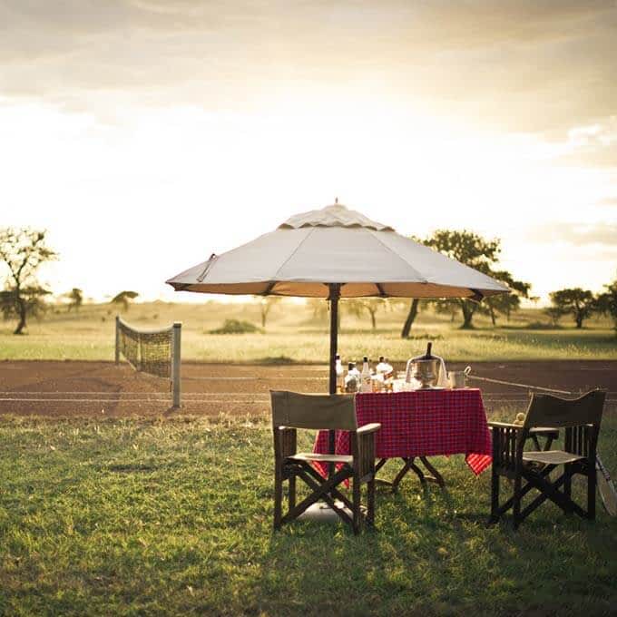 Play a game of 'bush' tennis at Singita in the Serengeti: now that is what we call a special setting!